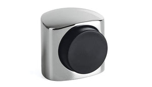 Metallic door handle with black center on a white background