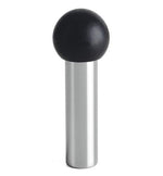 Black spherical object on a silver cylindrical stand against a white background