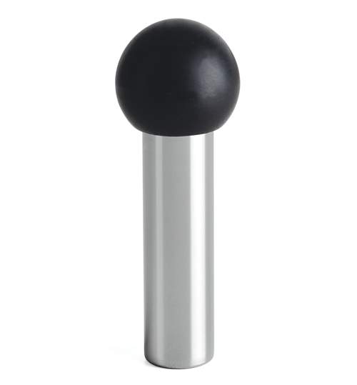 Black spherical object on a silver cylindrical stand against a white background