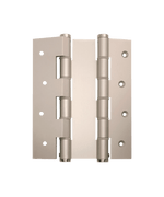 Pair of metallic door hinges on a green background