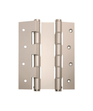 Pair of metallic door hinges on a green background