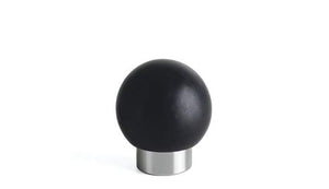 Black spherical knob on a white background