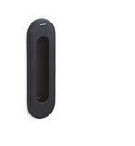 Black rectangular object with textured surface on a white background