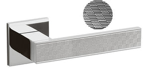 Chrome towel bar with textured detail on a white background