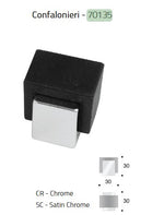Light fixture with black and silver design on a white background