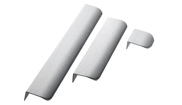 Three white cylindrical objects on a white background