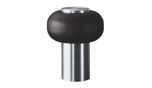Black and silver cylindrical object on a white background