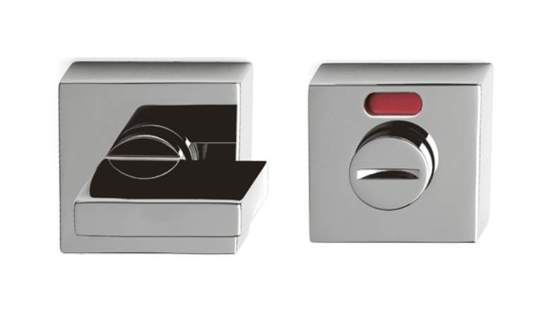 Two metallic door handles on a white background