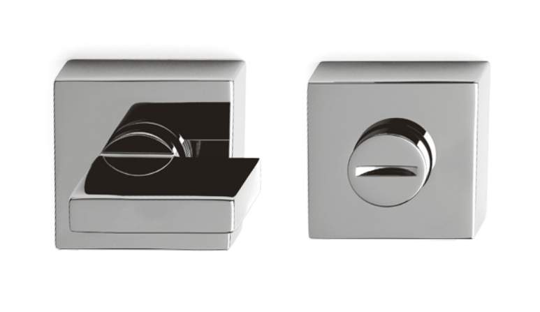 Chrome door handle and lock mechanism on a white background