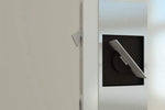 Modern light switch on a neutral wall