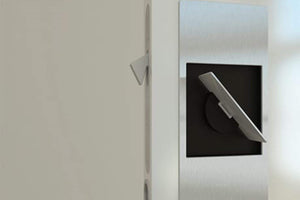 Modern light switch on a neutral wall