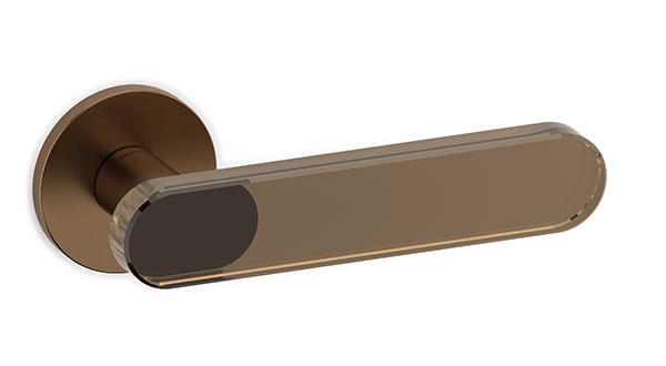Bronze door handle on a white background