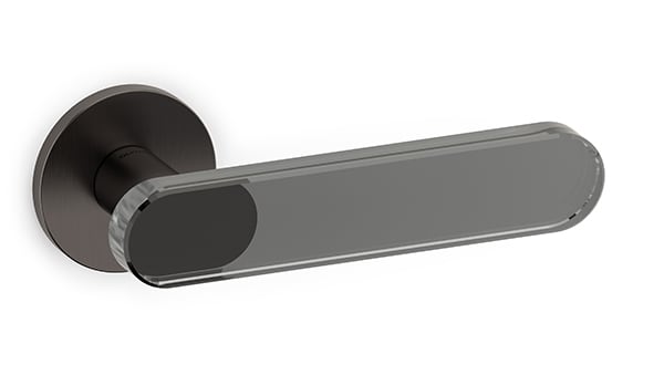 Door handle with a metallic finish on a white background
