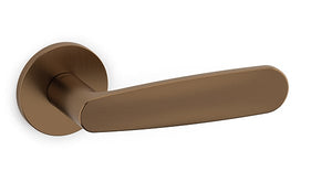 Bronze door handle on a white background
