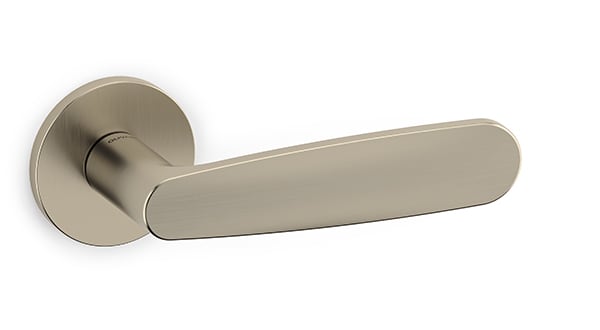Metallic door handle on a white background