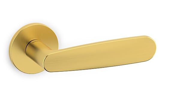 Gold door handle on a white background