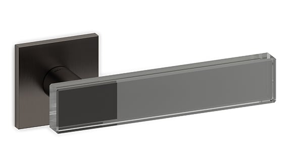 Metallic door handle on a white background