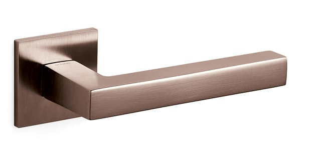 Metallic door handle on a white background