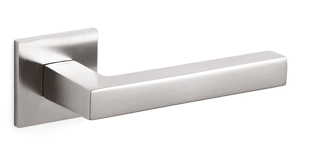 Metallic door handle on a white background