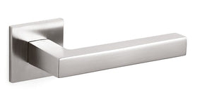 Metallic door handle on a white background