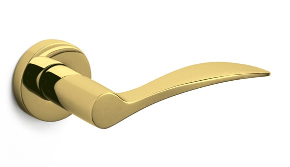 Gold door handle on a white background