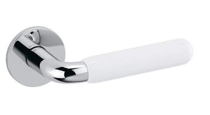 Chrome door handle with white handle on a white background