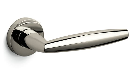 Polished chrome door handle on a white background