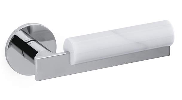 Chrome door handle with white cylindrical cover on a white background