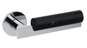 Chrome door handle with black cylindrical component on a white background