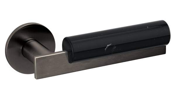 Black door handle on a white background
