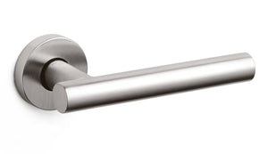 Stainless steel door handle on a white background