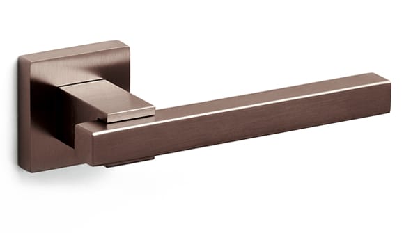 Bronze door handle on a white background