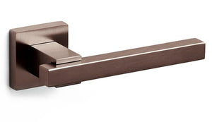 Bronze door handle on a white background