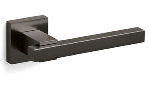 Black door handle on a white background