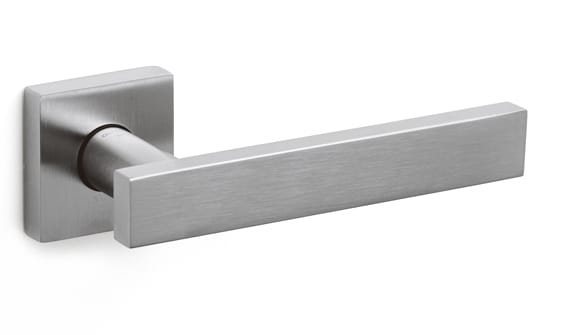 Metal door handle on a white background