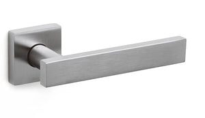 Metal door handle on a white background