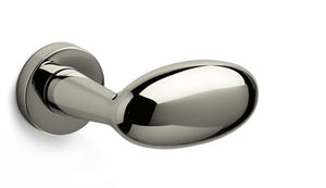 Polished chrome door handle on a white background