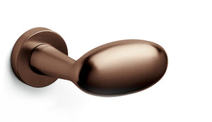 Bronze door handle on a white background