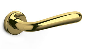 Gold door handle on a white background