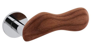 Wooden handle with metallic base on a white background