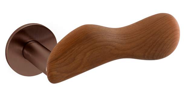 Wooden door handle on a white background