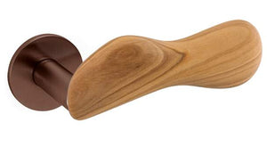 Wooden door handle with bronze finish on a white background