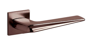 Metallic door handle on a white background