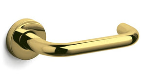 Gold door handle on a white background