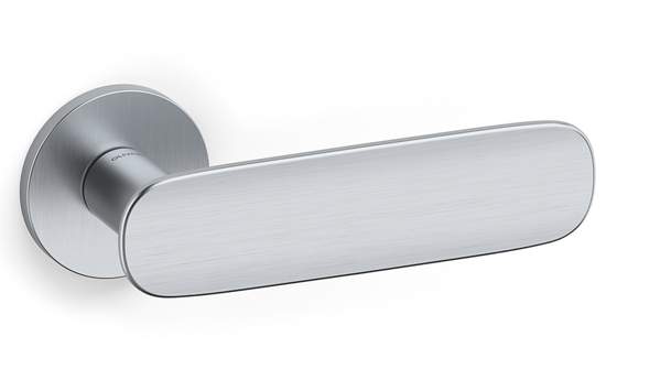 Metallic door handle on a white background