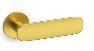 Gold door handle on a white background