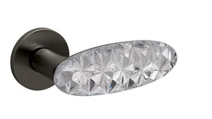 Door handle with crystal design on a white background