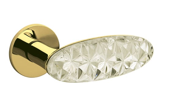 Door handle with gold finish and crystal design on a white background
