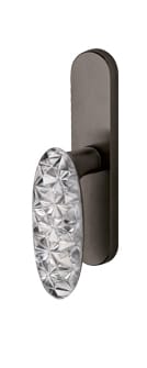 Decorative door handle with crystal design on a white background
