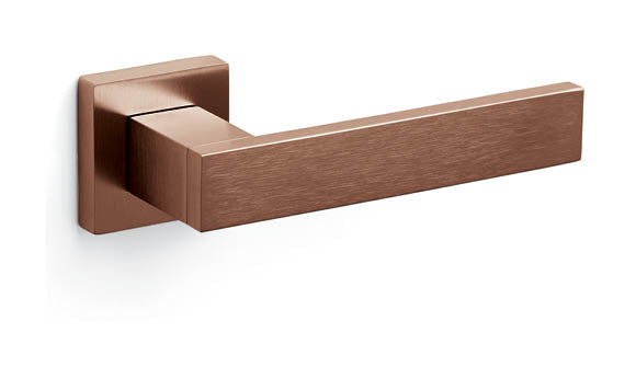 Bronze door handle on a white background